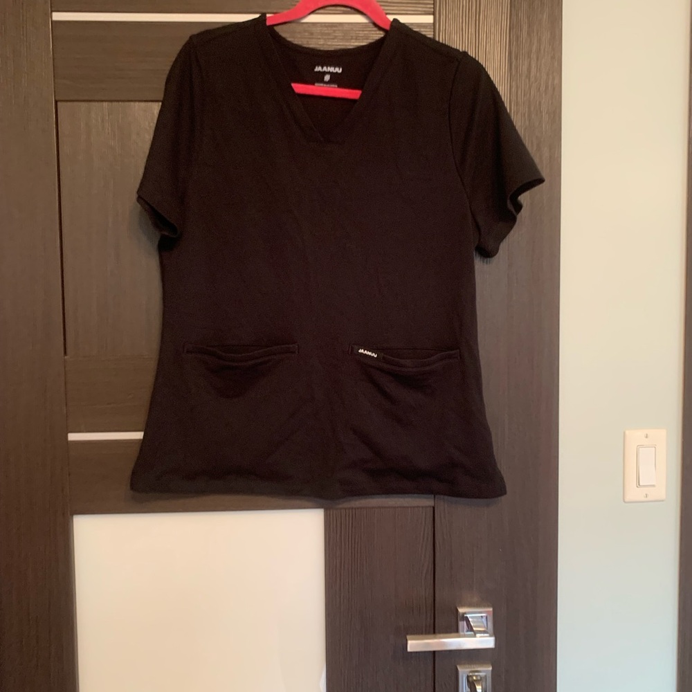 Jaanuu Slim Scrub Top, size L .Excellent condition.